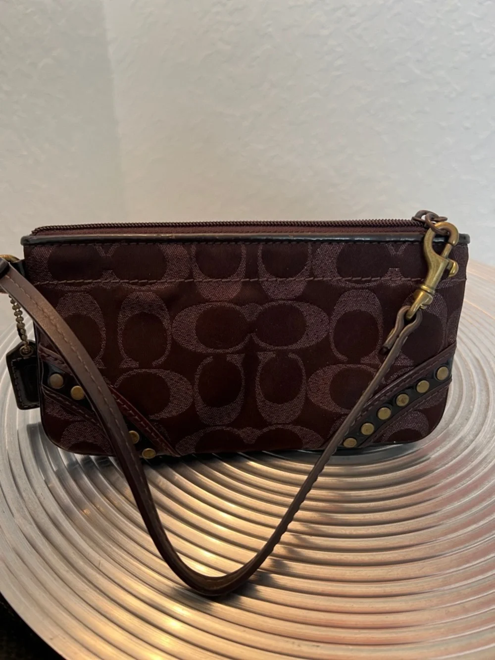 COACH EUC BROWN with BLACK PATENT WRISTLET